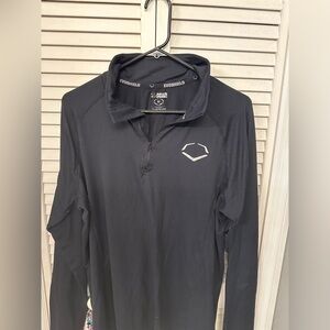 Evoshield 1/4 zip long sleeve women’s dri fit like shirt.  Size medium